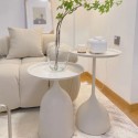 E06.26Ensemble  table basse  ronde pied  calice   blanc / noir